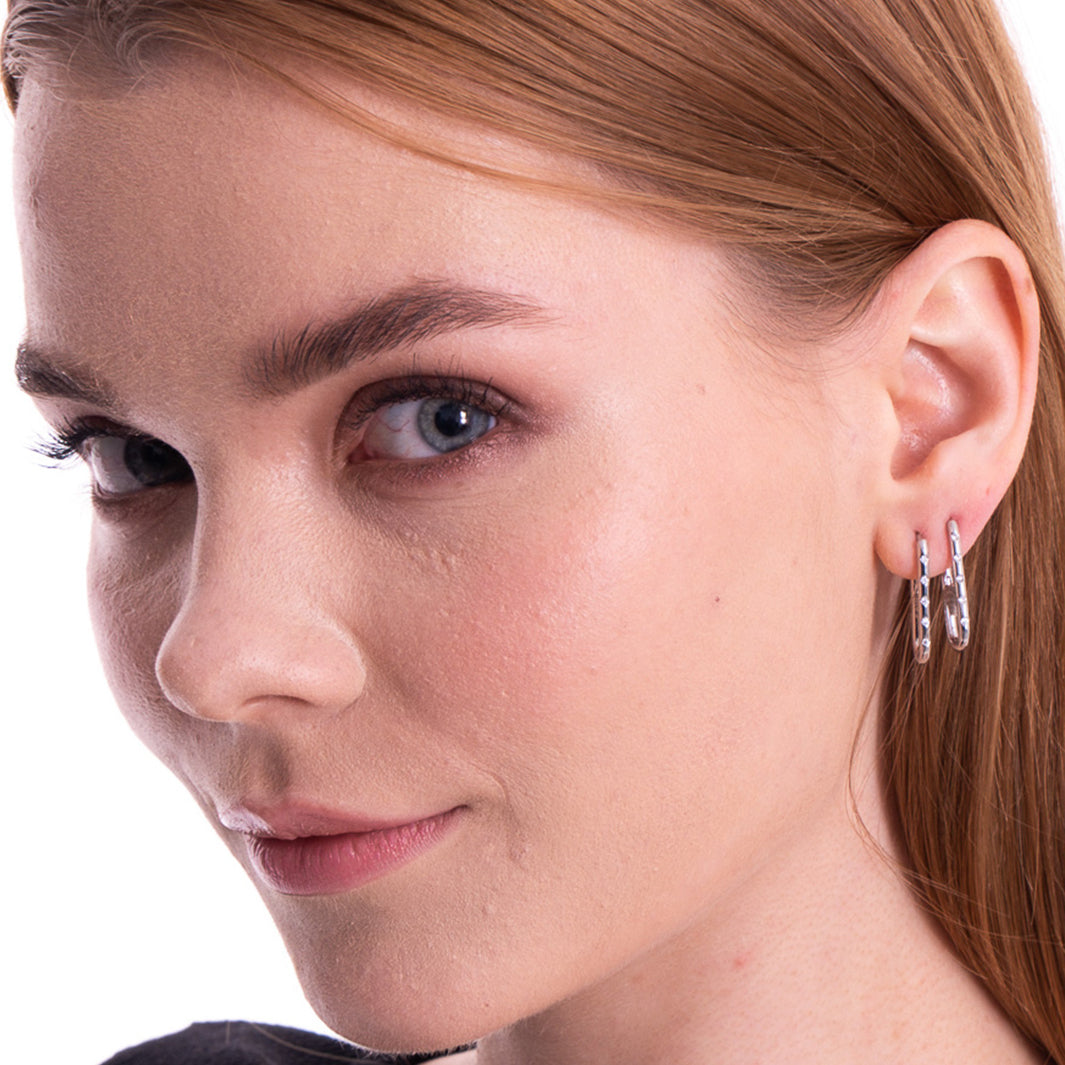 Aera Berlin Jewelry - Vesta Elips Huggie Earring Sterling Silver Model Photo Right